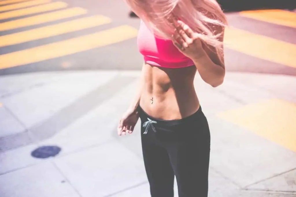 Woman with toned stomach after LA-EMS Body Sculpting Treatment Wembley Park